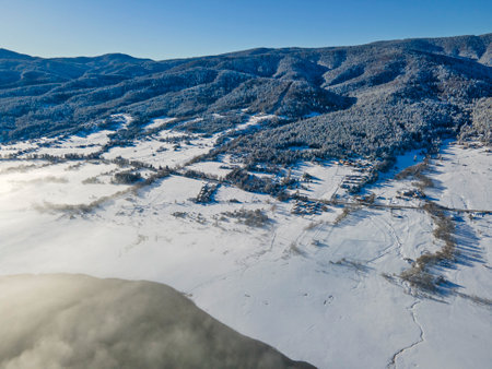 Aerial winter view of Batak Reservoir covered with clouds, Pazardzhik Region, Bulgariaの写真素材