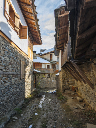 Winter Sunset view of Village of Kovachevitsa with Authentic nineteenth century houses, Blagoevgrad Region, Bulgariaの写真素材