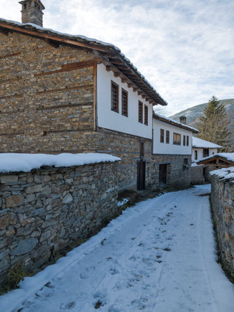 Winter Sunset view of Village of Kovachevitsa with Authentic nineteenth century houses, Blagoevgrad Region, Bulgariaの写真素材