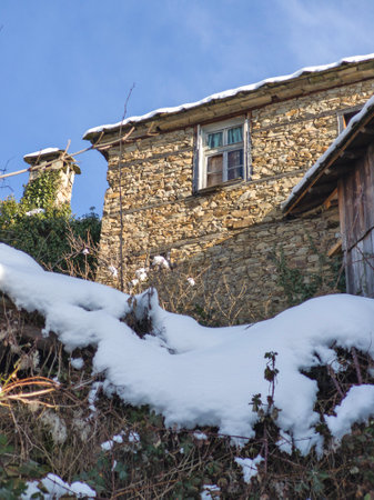 Winter view of Village of Kovachevitsa with Authentic nineteenth century houses, Blagoevgrad Region, Bulgariaの写真素材