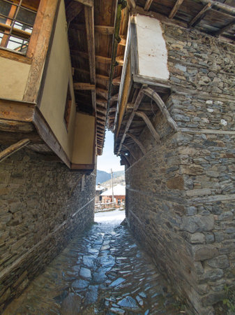 Winter view of Village of Kovachevitsa with Authentic nineteenth century houses, Blagoevgrad Region,...
