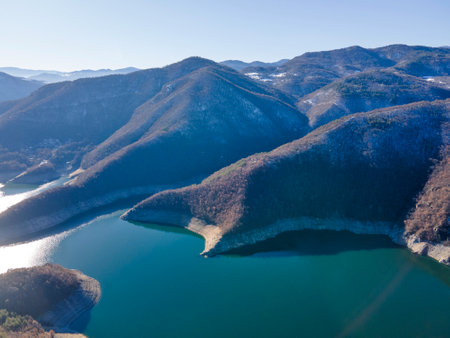 Aerial winter view of Vacha (Antonivanovtsi) Reservoir, Rhodope Mountains, Plovdiv Region, Bulgariaの写真素材