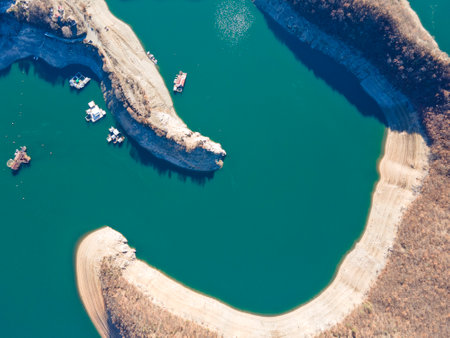 Aerial winter view of Vacha (Antonivanovtsi) Reservoir, Rhodope Mountains, Plovdiv Region, Bulgariaの写真素材