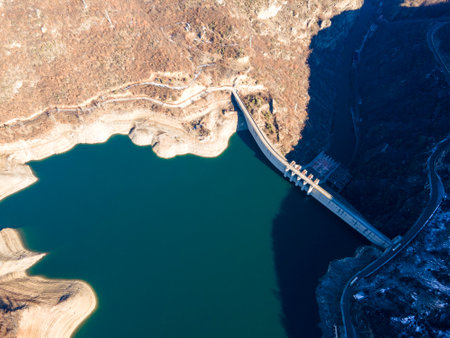 Aerial winter view of Vacha (Antonivanovtsi) Reservoir, Rhodope Mountains, Plovdiv Region, Bulgariaの写真素材