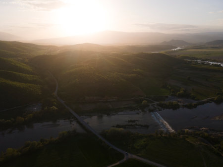 Aerial Sunset view of Struma river passing near village of Topolnitsa, Blagoevgrad region, Bulgariaの写真素材