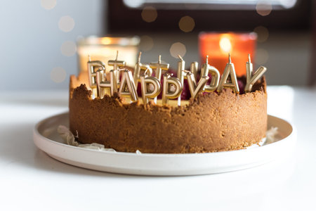 cheesecake birthday cake with raspberries and candles. High quality photo isolatedの写真素材