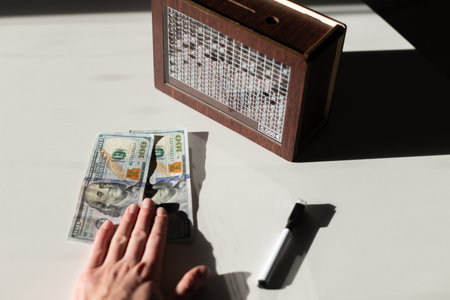 WOODEN MONEY BANK WITH GOAL COUNTER SAVING MONEY. High quality photo