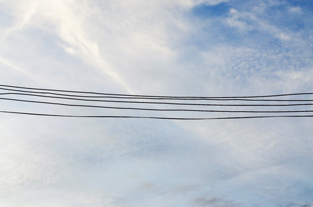 Electric wire and beautiful skyの写真素材