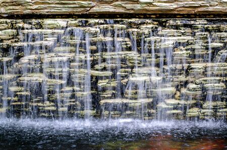 Waterfall is decorated in the garden.の写真素材