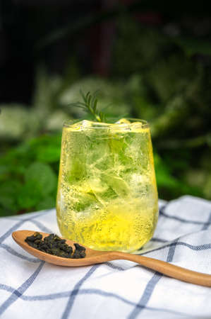 Cold brew tea refreshing in a clear glass with ice. Refreshment cold summer drink.の写真素材