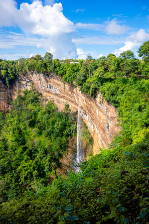 The naturally occurring rocky cliffs are covered with lush greenery on sun days in morning. Caused by changes in the earth's crust at canyon Nam Nao in Phetchabun Province unseen Thailand.の写真素材