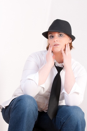 Fashionable Plus Size Model with a hat and tieの写真素材