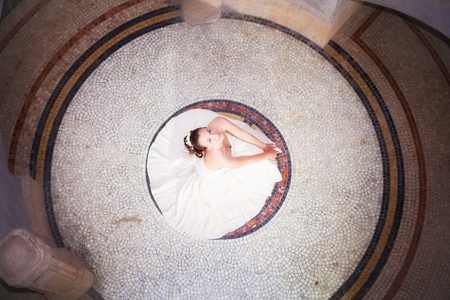 portrait of woman with reflection on mirrorの写真素材