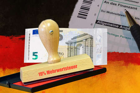 Stamp with inscription 19% VAT and banknote, in the background form and Germany colorsの写真素材