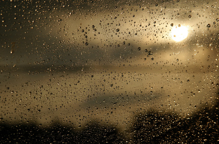 Water droplets and sunsetの写真素材
