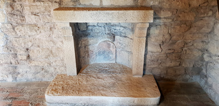 An ancient chimney inside a fantastic castle in San Marinoの写真素材