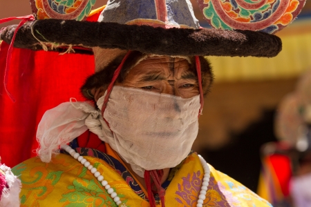 KARSHA, INDIA - JUL 17  A monk performs a religious mask dance during the Cham Dance Festival on Jul 17, 2012 in Karsha, India のeditorial素材