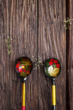 Russian traditional painted spoons on wooden backgroundの写真素材