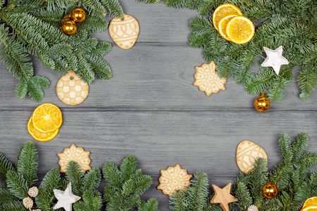 Holiday Decorations. Christmas composition with cookie and orange slices. Space for a text, view from aboveの写真素材