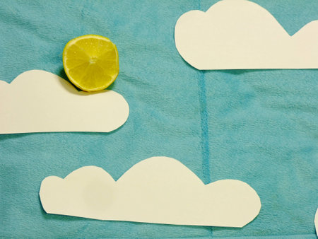 Flat Lay Composition of Sun shining trough the Cloudsの写真素材