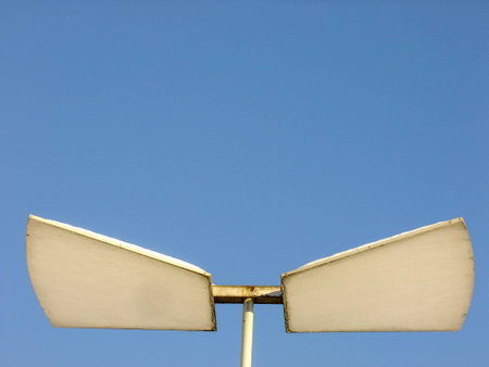 Lighting Fixture on aluminium Pole in Background of blue Skyの写真素材