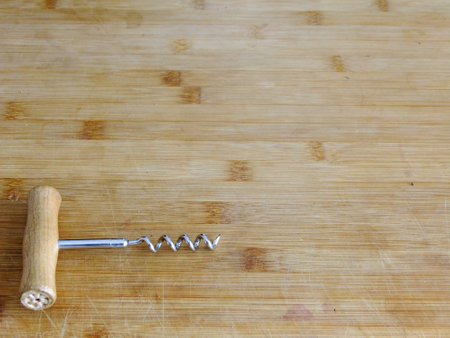 Wine Bottle Opener on left Side of wooden Cutting Board