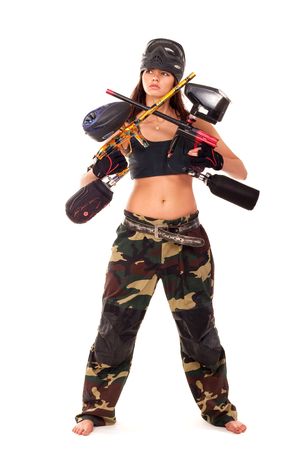 Sexy young girl posing like playing paintballの写真素材