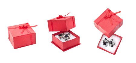 Earring in red present box isolated on whiteの写真素材