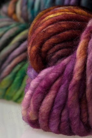 Set of colorful wool yarn balls. Closeup photo.