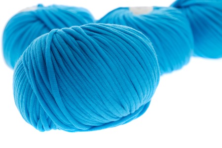 Set of blue wool yarn balls. Closeup photo.の写真素材