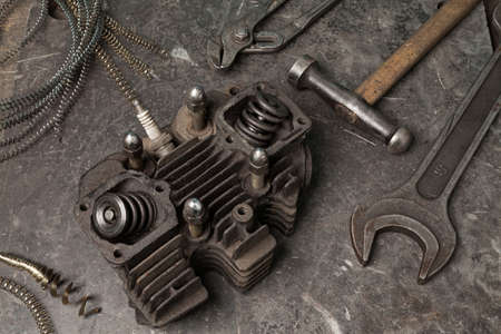 Old tools set on a vintage metallic background