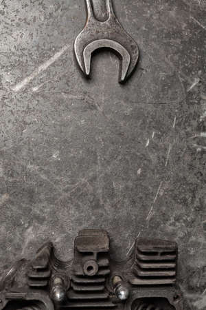 Old tools set on a vintage metallic background with space for text