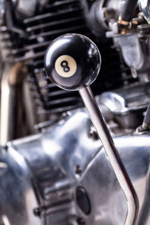 Custom bobber motorbike in an workshop garage.