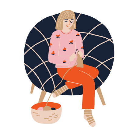 Cheerful woman is sitting in pajamas and socks in armchair and knitting. Yarn in basket and girl in cozy armchair. Vector illustration in modern flat style isolated on white backgroundのイラスト素材