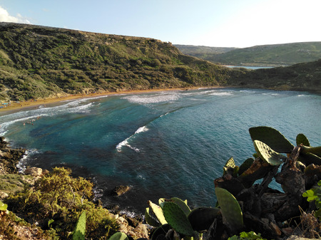 Comino island blue lagoon. Malta blue turquoise sea water beach. Rock and cliff sunny seashore. Travel mediterranean.の写真素材