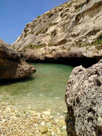 Narrow bay isolated under blue skyの写真素材