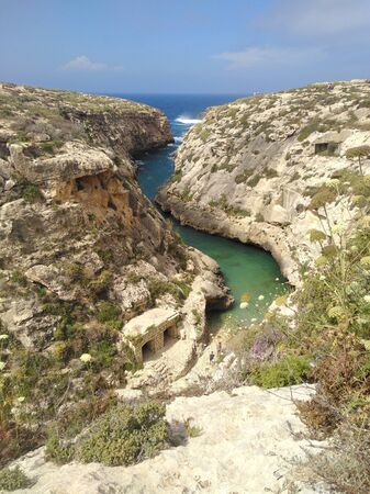 Narrow bay isolated under blue skyの写真素材