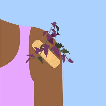 Sticking plaster with flowers on a human shoulder.