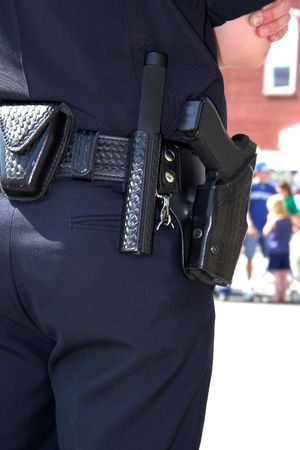 Policeman watching over little children playing