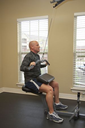 Solder exercising in gym, He suffered gun shot wounds in Iraq