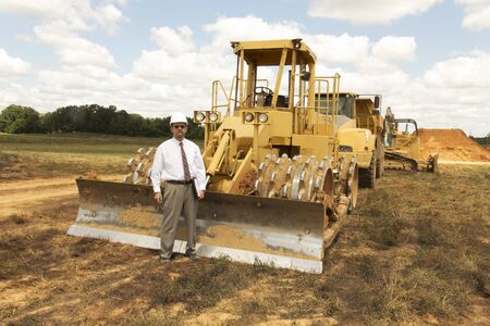 Bank finance personal inspecting new  mall that his company financed