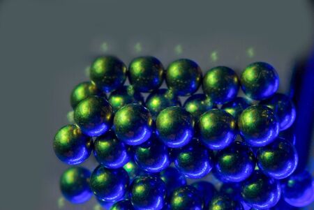 Little blue green Metallic Magnetic balls togetherの写真素材
