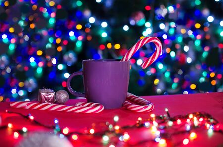 Cup of coffee with on red background. Christmas beatiful still life.の写真素材