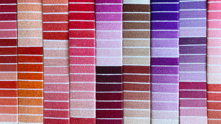 Texture of multi-coloured threads of different materials