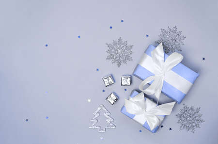 Christmas decorations and presents on a blue backgroundの写真素材