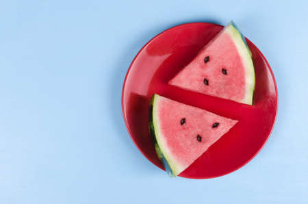 Plate with sliced fresh watermelon, studio shotの写真素材