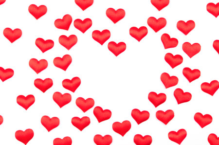 Frame made of red hearts on the white background