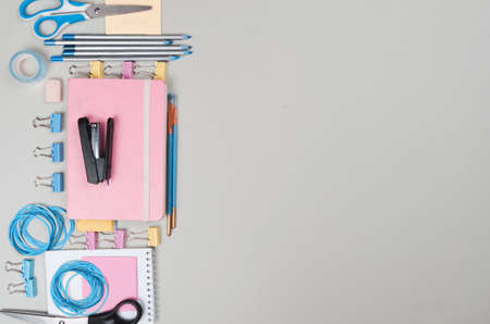 Different school supplies on light grey backgroundの写真素材