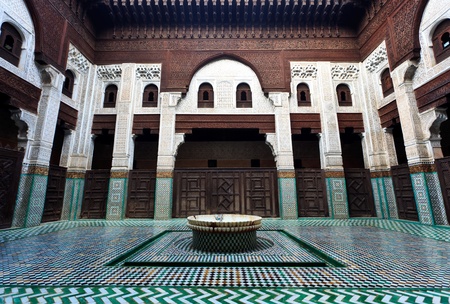 Meknes, Morocco: Intricate and symetrical mosaic tiled interior courtyard of Muslim madrasah school in Meknes, Morocco.のeditorial素材