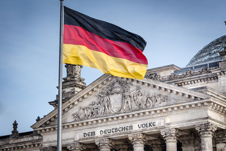 German Bundestag  Reichstag  with the German Flag in a breezeのeditorial素材